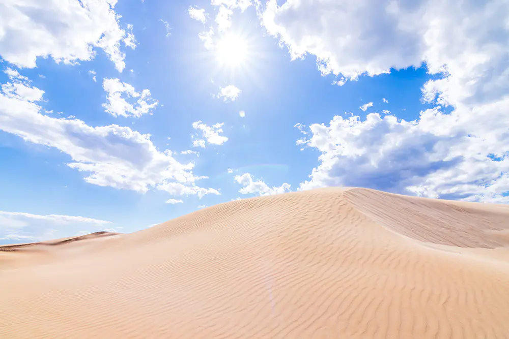 Photograph of a desert, heavenly sky